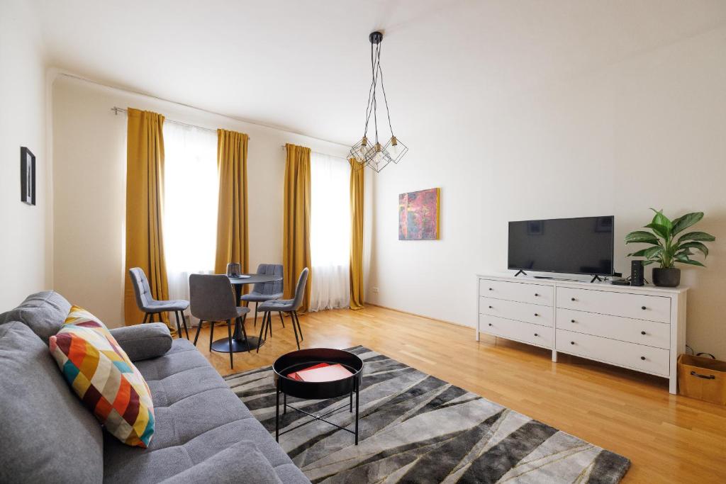 Telewizja i/lub zestaw kina domowego w obiekcie Vienna City Apartments Krongasse