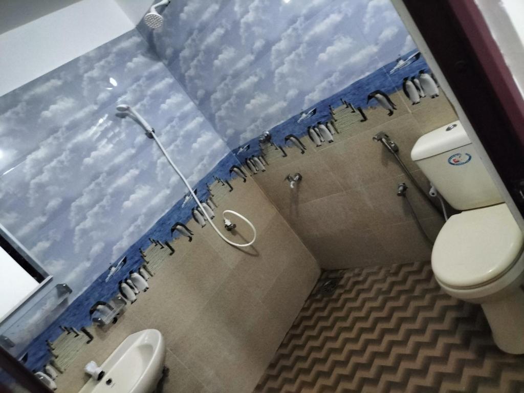 Koupelna v ubytování Suman Beach Rooms