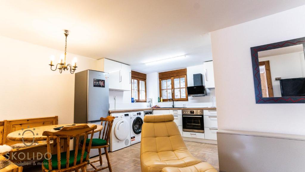 Kuchyň nebo kuchyňský kout v ubytování Gemütliches Ferienhaus Brigerbad