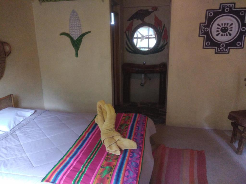 Voodi või voodid majutusasutuse Salkantay Hostel Chaullay toas