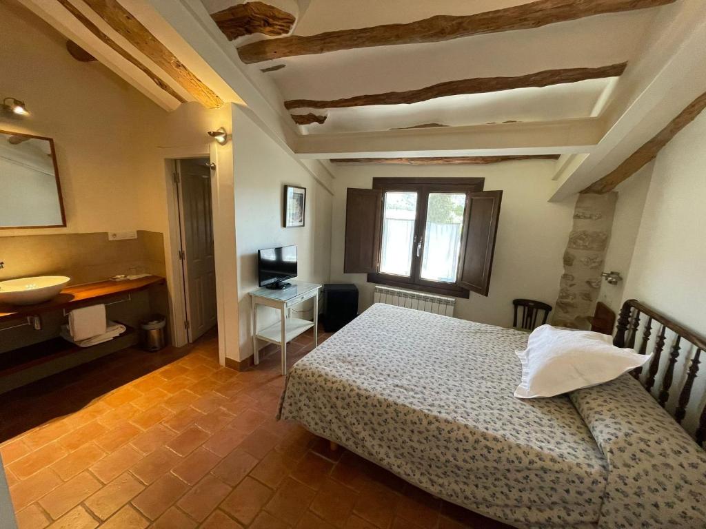 Postel nebo postele na pokoji v ubytování Torre Alta de Ram