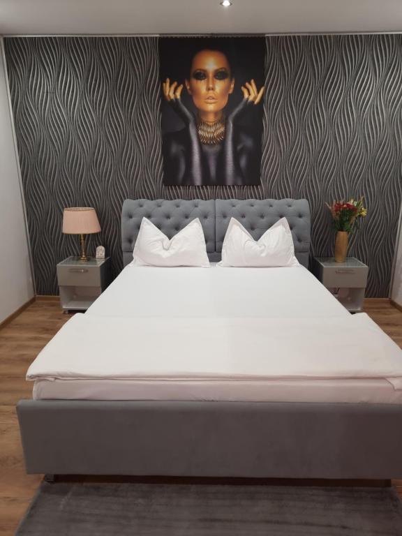 Кровать или кровати в номере Casa Petcu