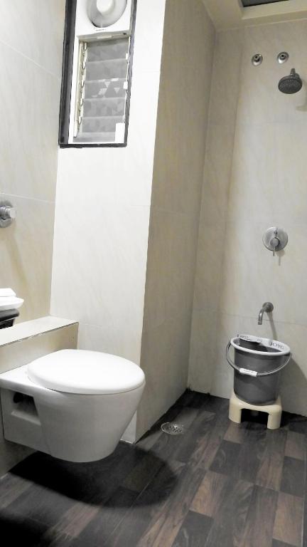 Koupelna v ubytování Hotel Sai Miracle