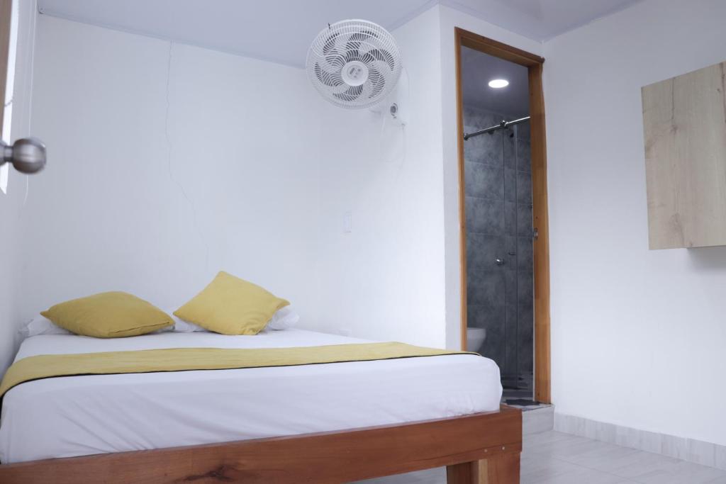 Postel nebo postele na pokoji v ubytování Hosteria La Medusa
