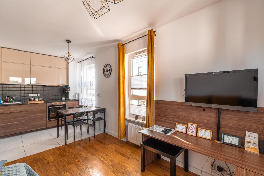 Kuchyňa alebo kuchynka v ubytovaní Apartament Chmielna Loft