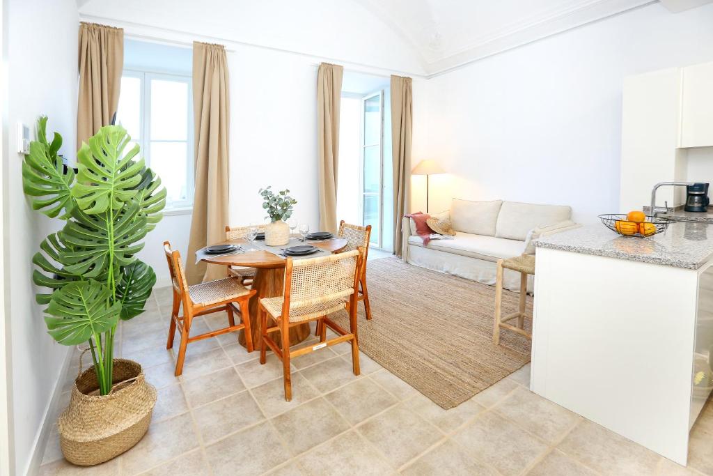 Η κουζίνα ή μικρή κουζίνα στο Dolce Faro Niente Apartment