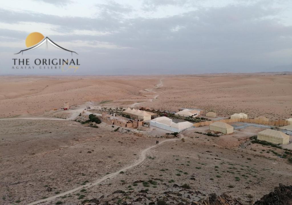 an aerial view of a village in the desert at The Original Camp in Aït Daoud