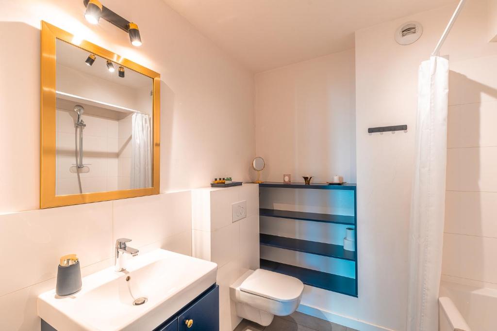 Kúpeľňa v ubytovaní Apartament Chmielna Gold