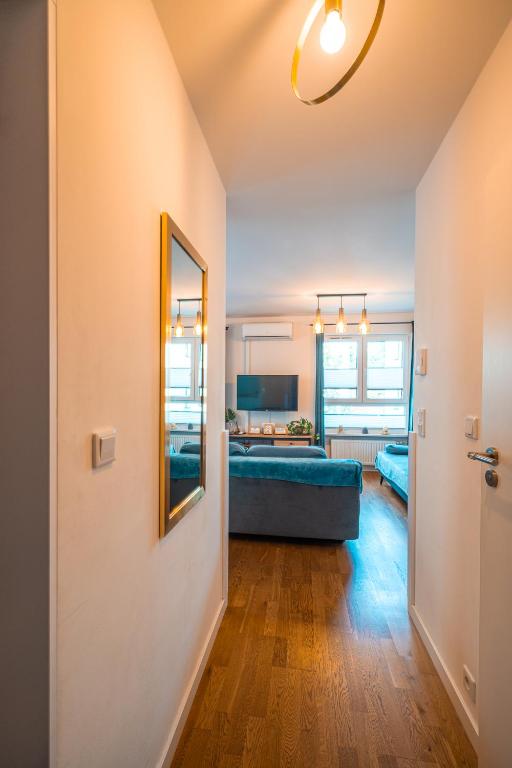 Posteľ alebo postele v izbe v ubytovaní Apartament Chmielna Gold