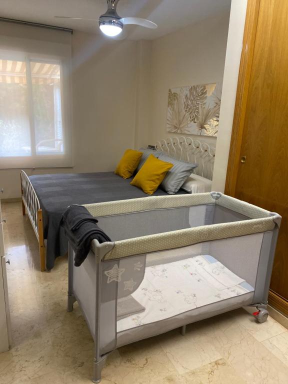 Postel nebo postele na pokoji v ubytování Soleado Albir