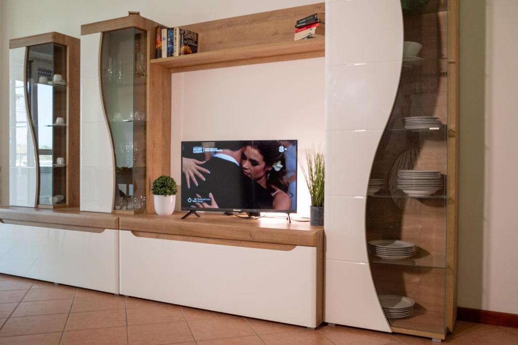 TV a/nebo společenská místnost v ubytování Isa Center - Leonardo Accademy - MXP - Lakes