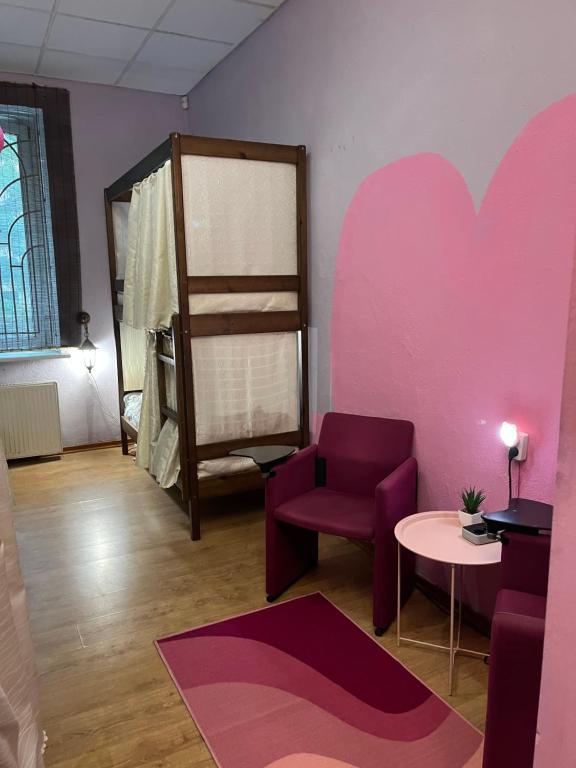 Postel nebo postele na pokoji v ubytování ArArAt-PODOL Hostel KYIV
