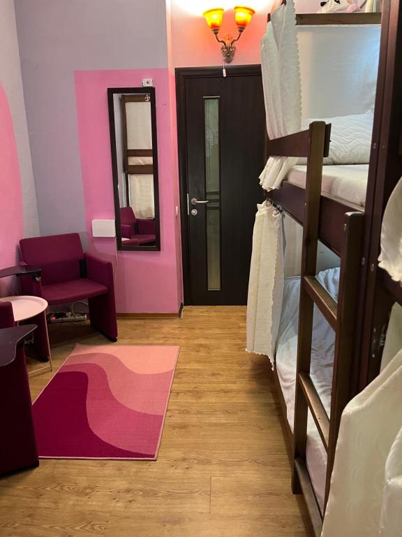 Postel nebo postele na pokoji v ubytování ArArAt-PODOL Hostel KYIV