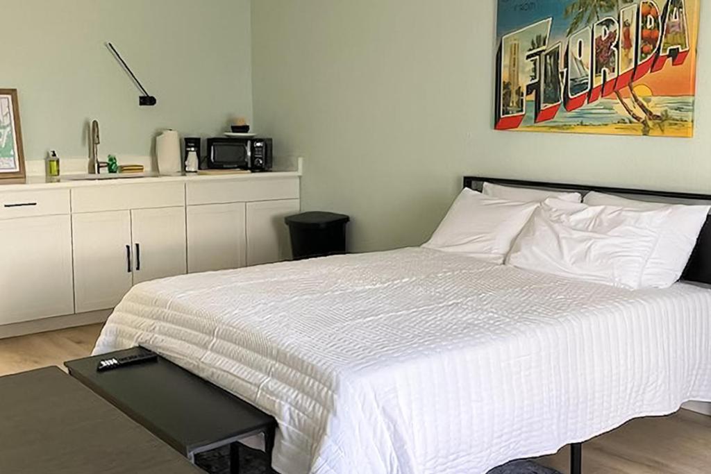 Кровать или кровати в номере Capri 104