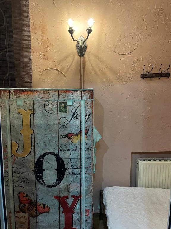 Postel nebo postele na pokoji v ubytování ArArAt-PODOL Hostel KYIV