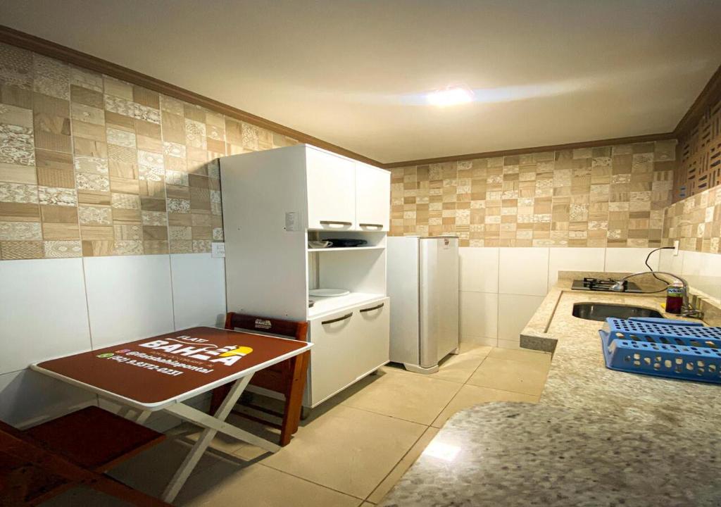 Kuchyň nebo kuchyňský kout v ubytování Flats Bahia