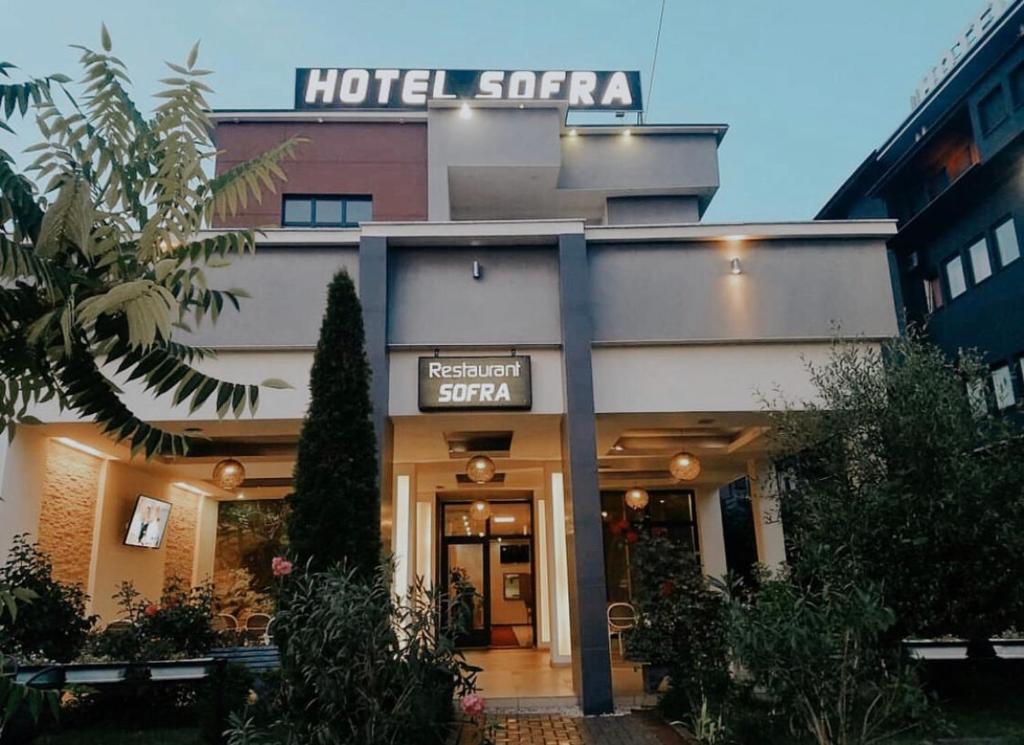 a hotel sotera with a sign on top of it at Hotel sofra in Ferizaj