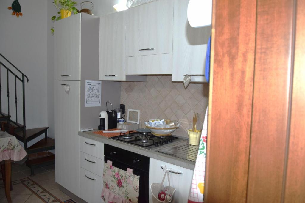 Kuchyňa alebo kuchynka v ubytovaní Casa Naida