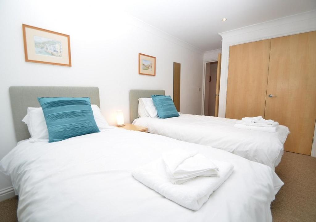 Postel nebo postele na pokoji v ubytování Inglewood Apartments