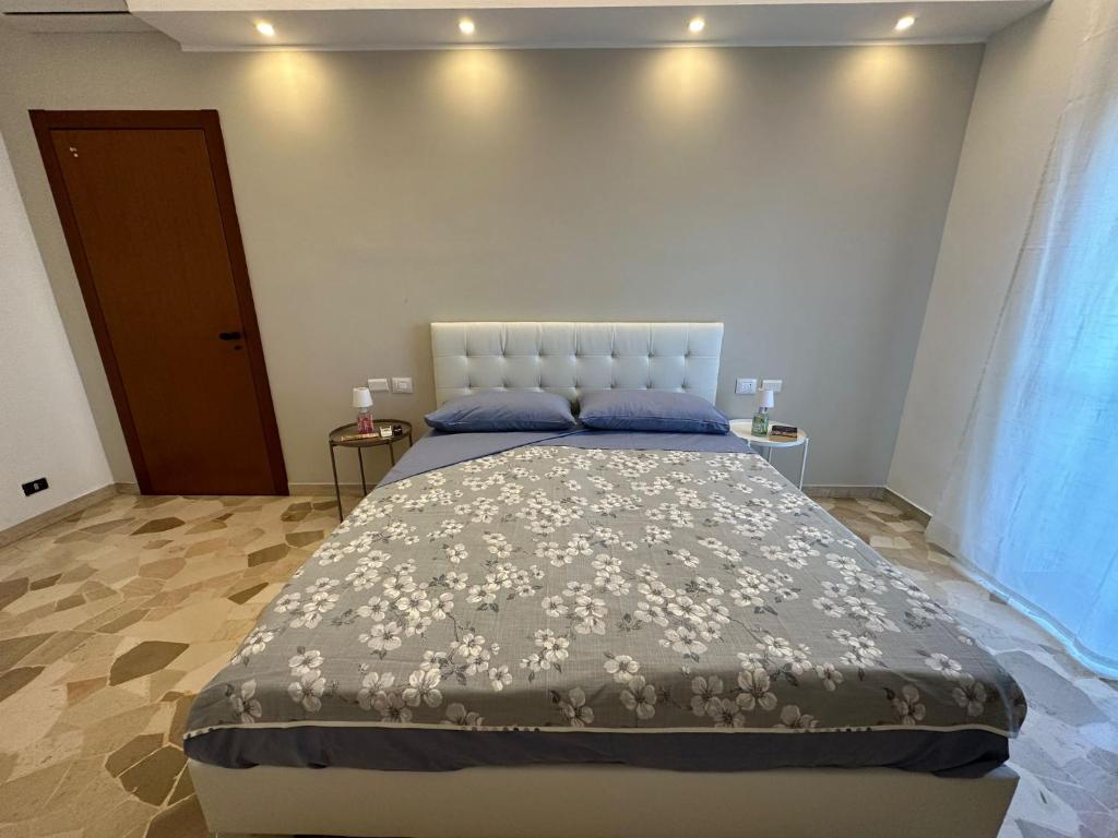 Postel nebo postele na pokoji v ubytování MyCosmoStudio