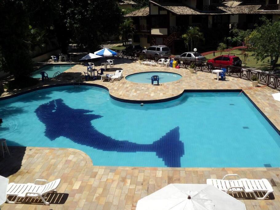 Kolam renang di atau dekat dengan L2 Casa condomínio tipo resort frente a praia.
