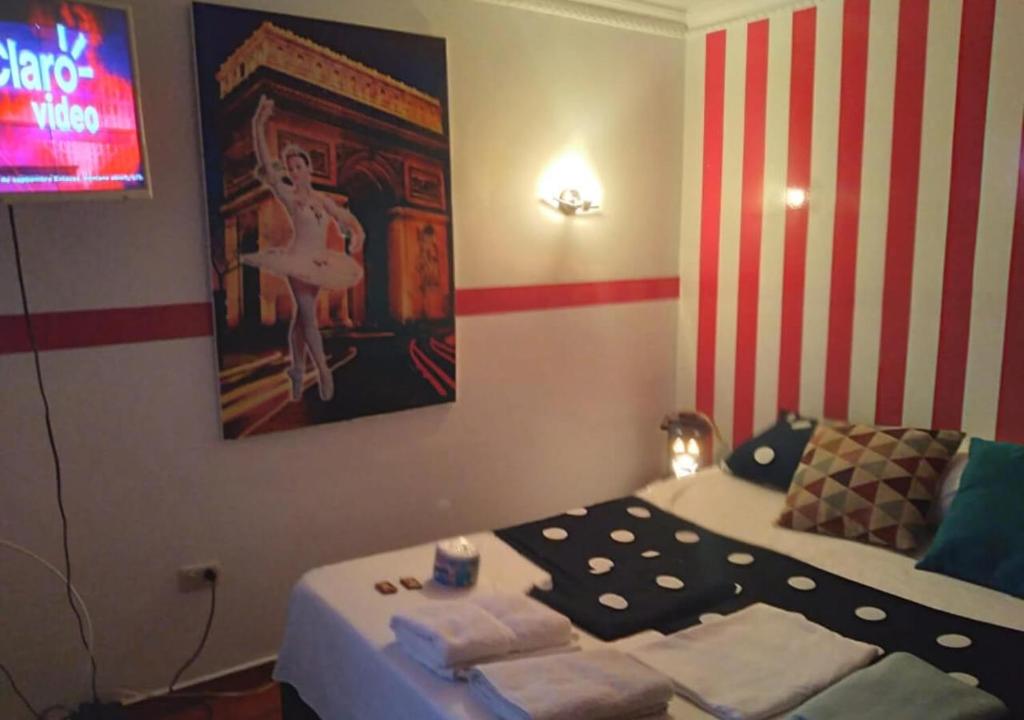 Voodi või voodid majutusasutuse Casa hotel Mi Huila toas
