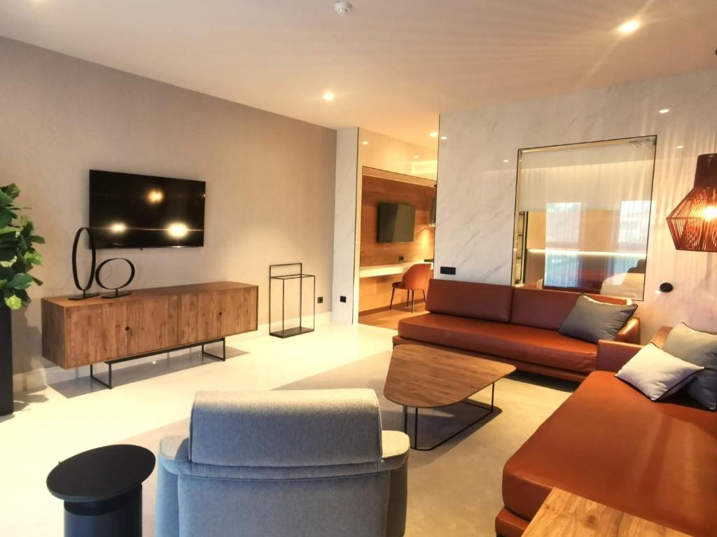 Uma televiso e/ou sistema de entretenimento em Alambique - Hotel Resort & Spa