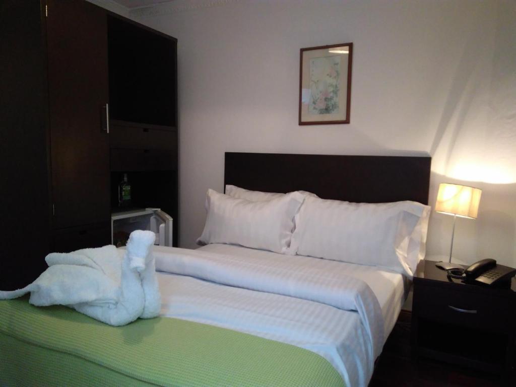 Postel nebo postele na pokoji v ubytování Casa Coliving Day 121