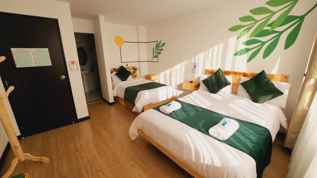 Postel nebo postele na pokoji v ubytování Hotel Natural Sevgi