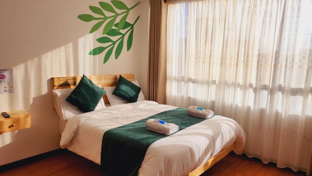 Postel nebo postele na pokoji v ubytování Hotel Natural Sevgi