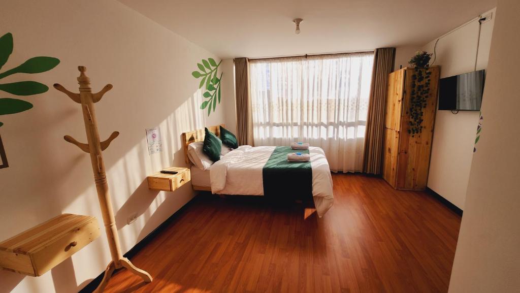Postel nebo postele na pokoji v ubytování Hotel Natural Sevgi