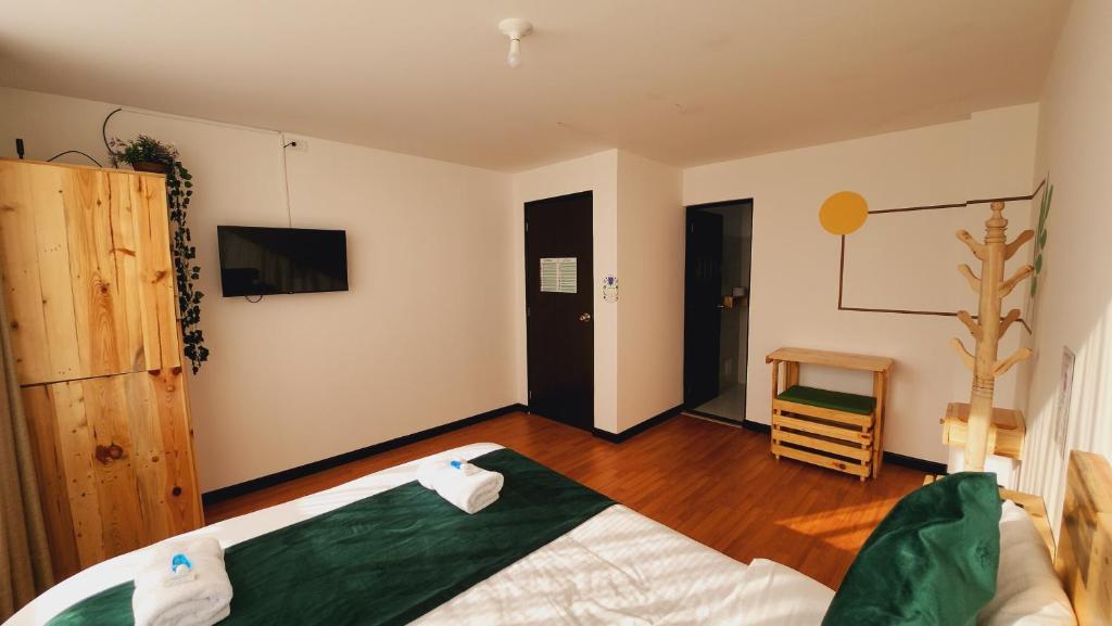 Postel nebo postele na pokoji v ubytování Hotel Natural Sevgi
