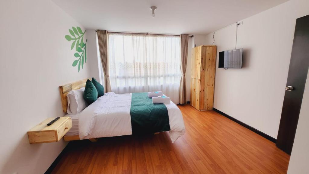 Postel nebo postele na pokoji v ubytování Hotel Natural Sevgi