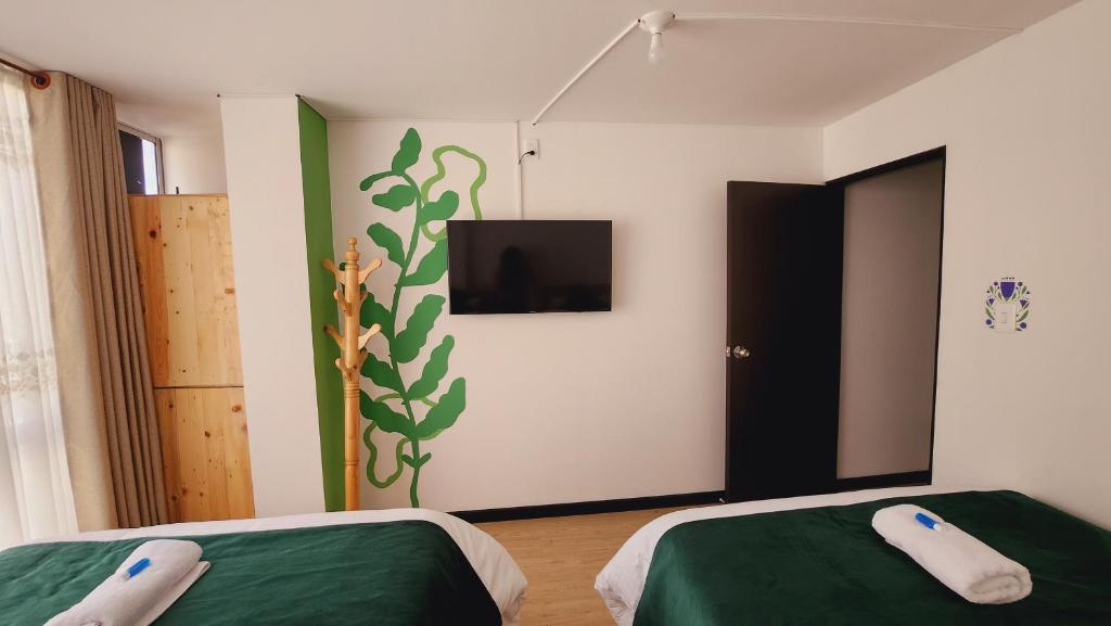 Postel nebo postele na pokoji v ubytování Hotel Natural Sevgi