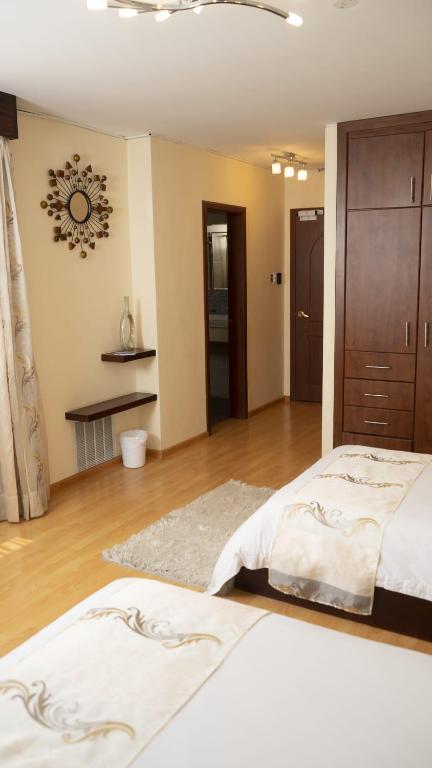 Postel nebo postele na pokoji v ubytování Hotel Ficoa