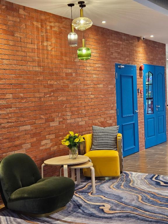 Posezení v ubytování Le'genda Hotel