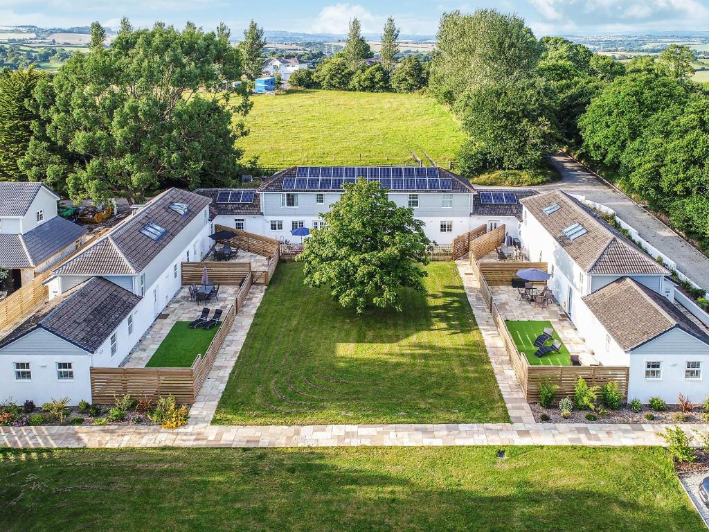 an aerial view of a house with a yard at Willow Cottage - Uk38484 in Saltash