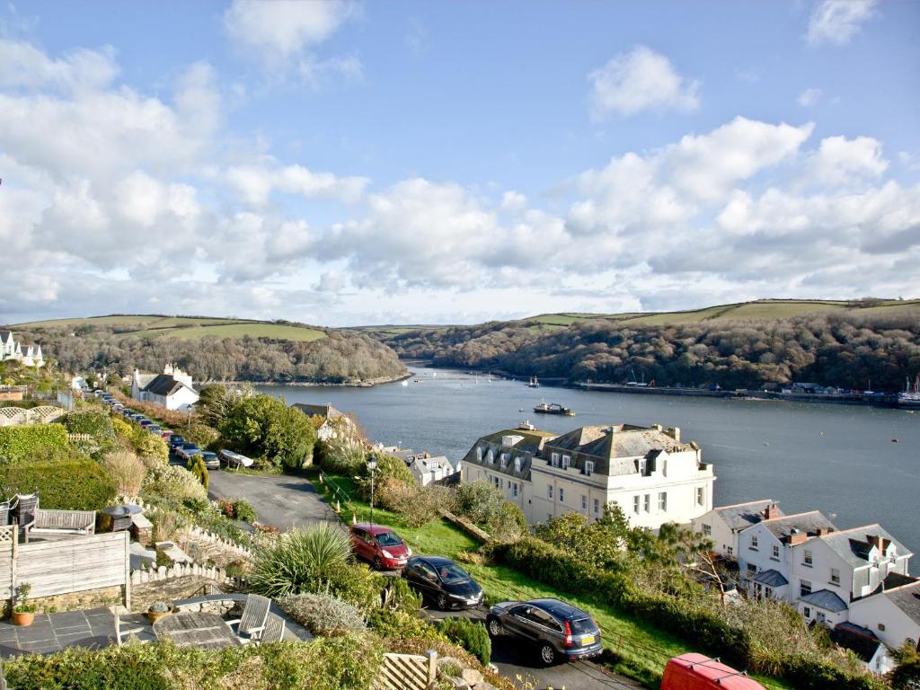 a view of a town with a river and houses at Anchor Loft in Fowey