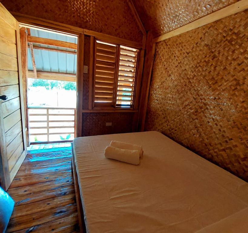 Postel nebo postele na pokoji v ubytování B&R Hostel Nagtabon