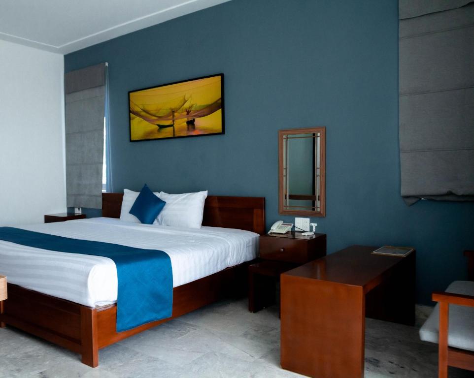 Postel nebo postele na pokoji v ubytování Hilary Boutique Villa Hội An