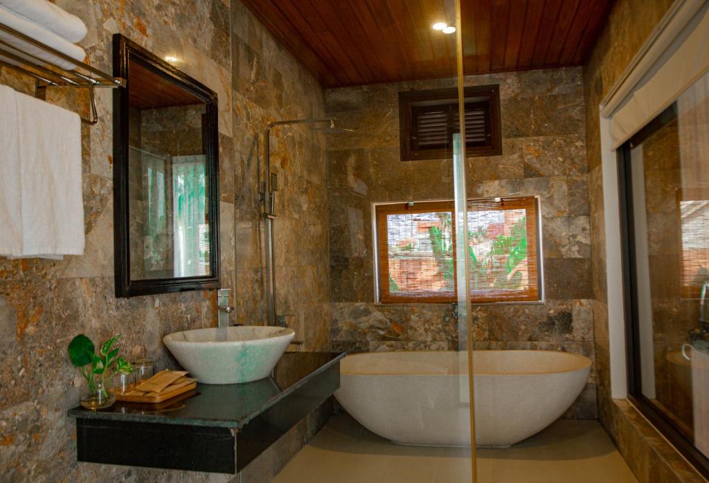 Koupelna v ubytování Hilary Boutique Villa Hội An