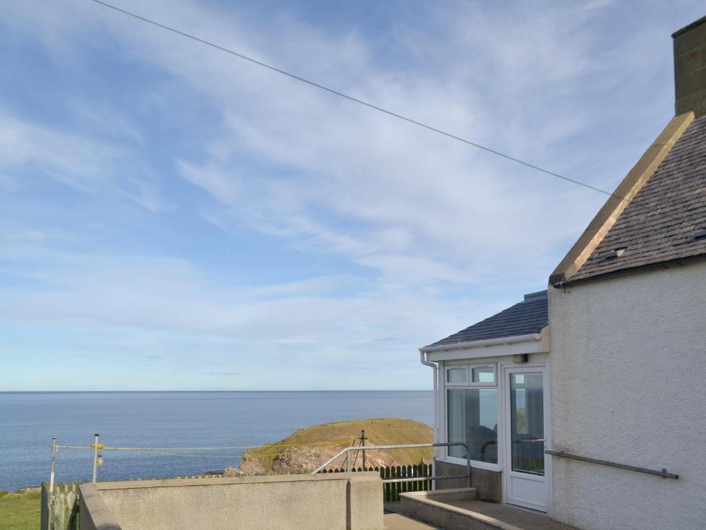 a house with a view of the ocean at Seabreezes - Uk30690 in Portknockie