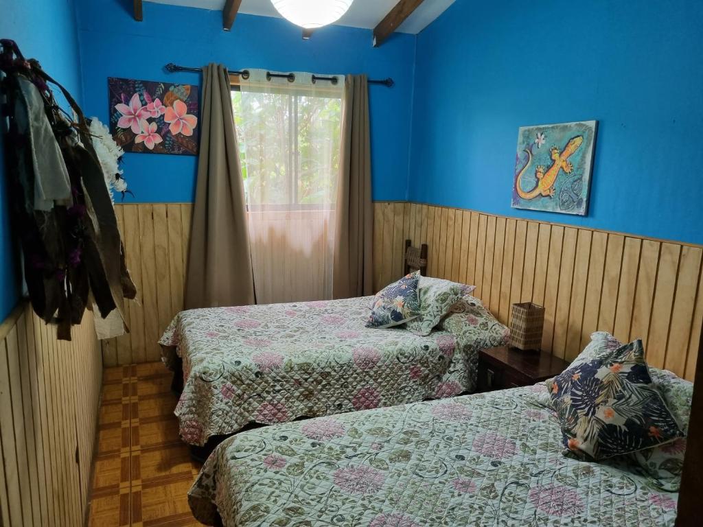 Postel nebo postele na pokoji v ubytování Hostal Vieroto