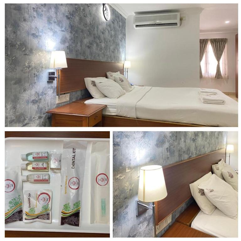 Postel nebo postele na pokoji v ubytování Kings Hotel Egmore