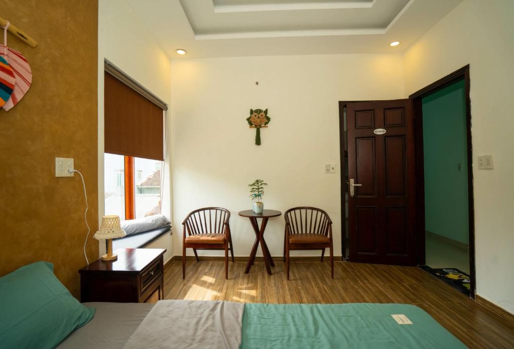 Postel nebo postele na pokoji v ubytování Tâm Family Homestay-Huế