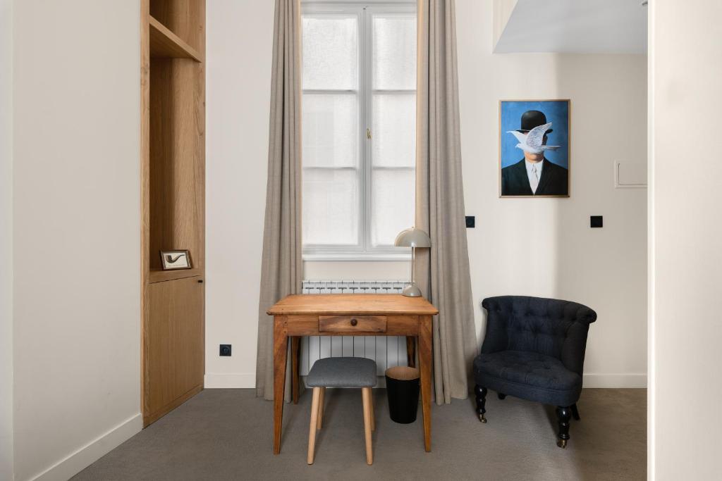 Posezení v ubytování Le Phénix Hôtel