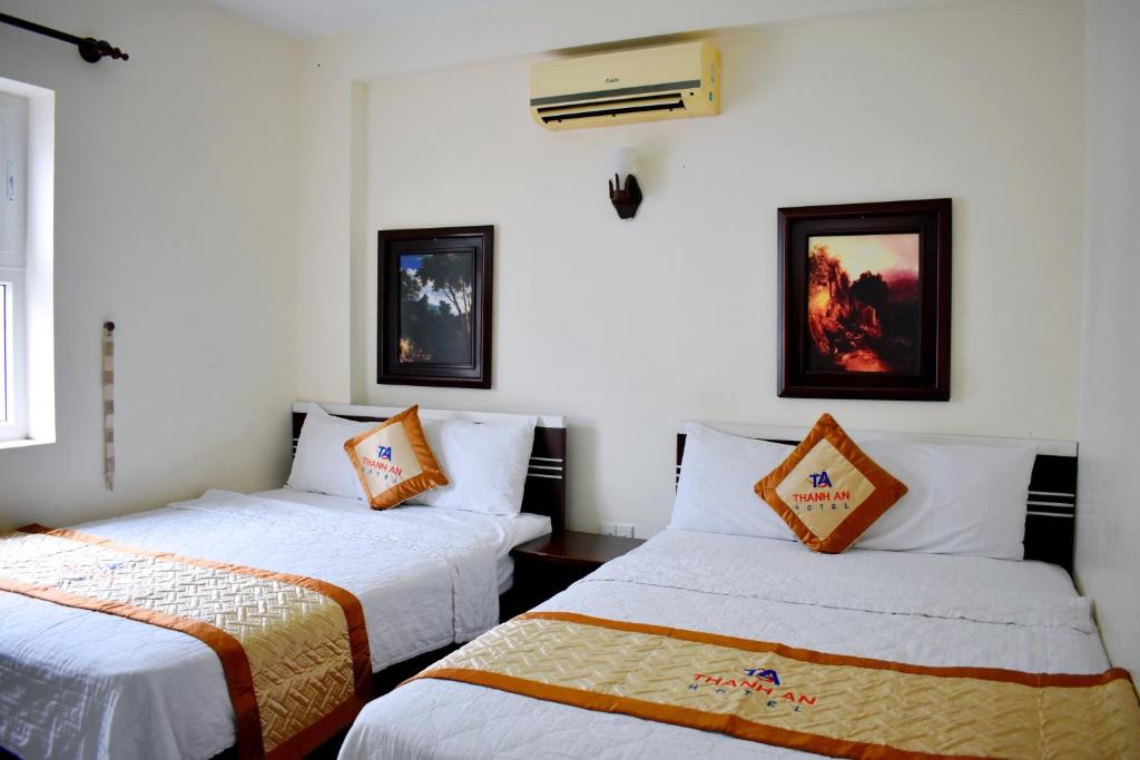 Vuode tai vuoteita majoituspaikassa Thanh An Hotel
