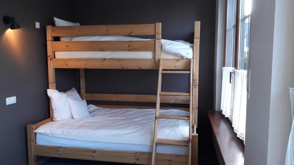 Postel nebo postele na pokoji v ubytování Villa Franzen