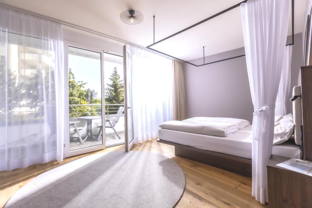 Ein Bett oder Betten in einem Zimmer der Unterkunft Schwarzwald Panorama