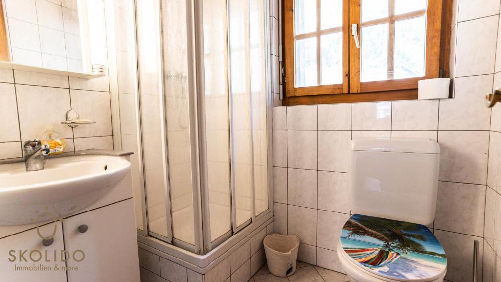 Koupelna v ubytování Gemütliches Ferienhaus Brigerbad